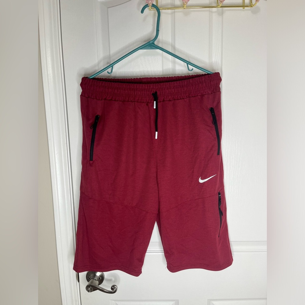 Red Nike fleece shorts